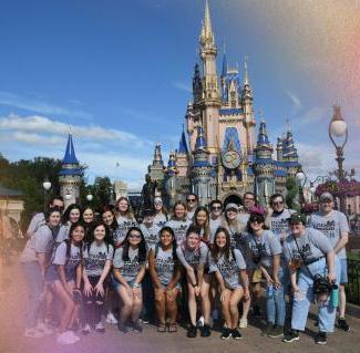 Students in front of the Disney castle